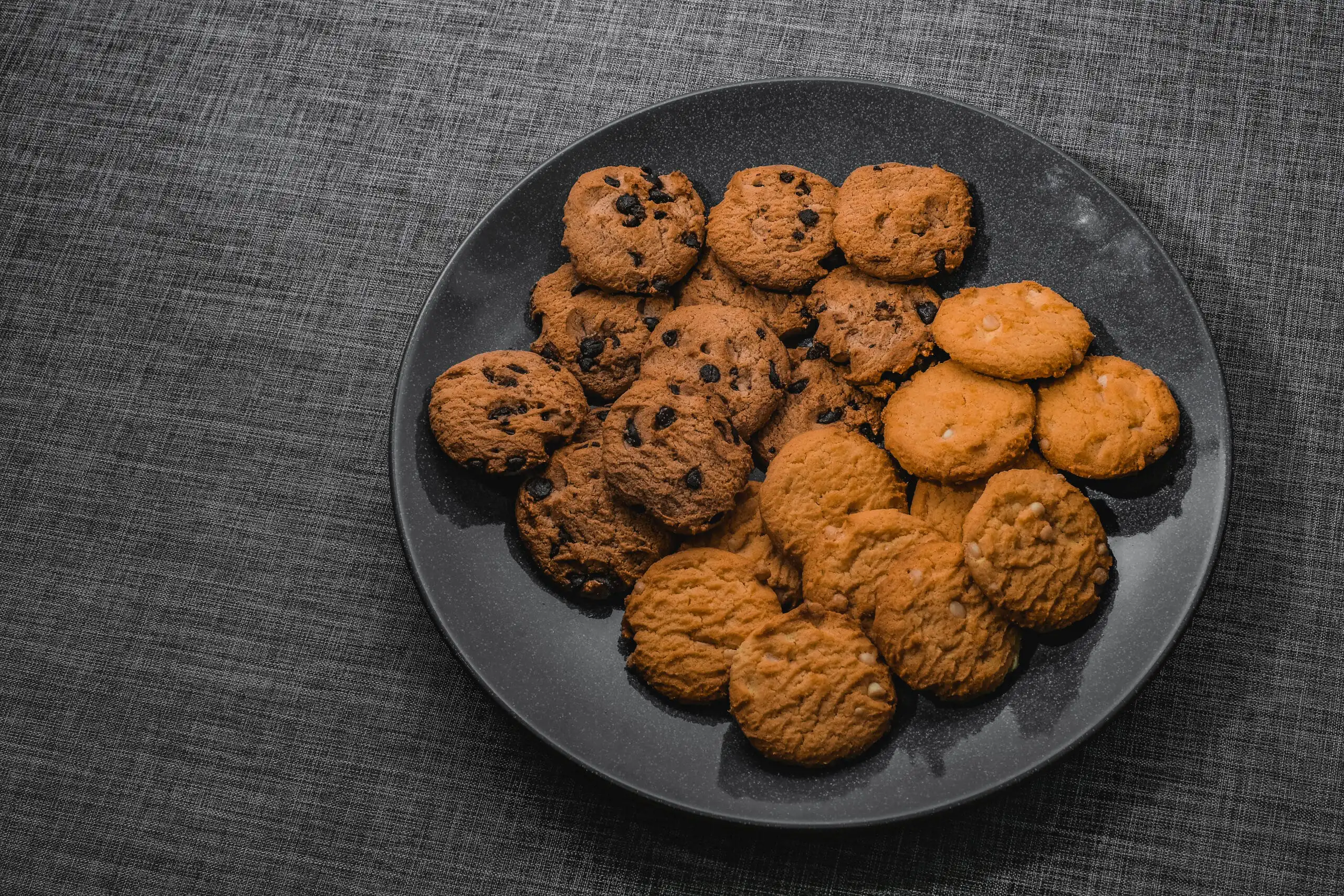 Close-up of a chewy chocolate chip cookie with a golden-brown crust