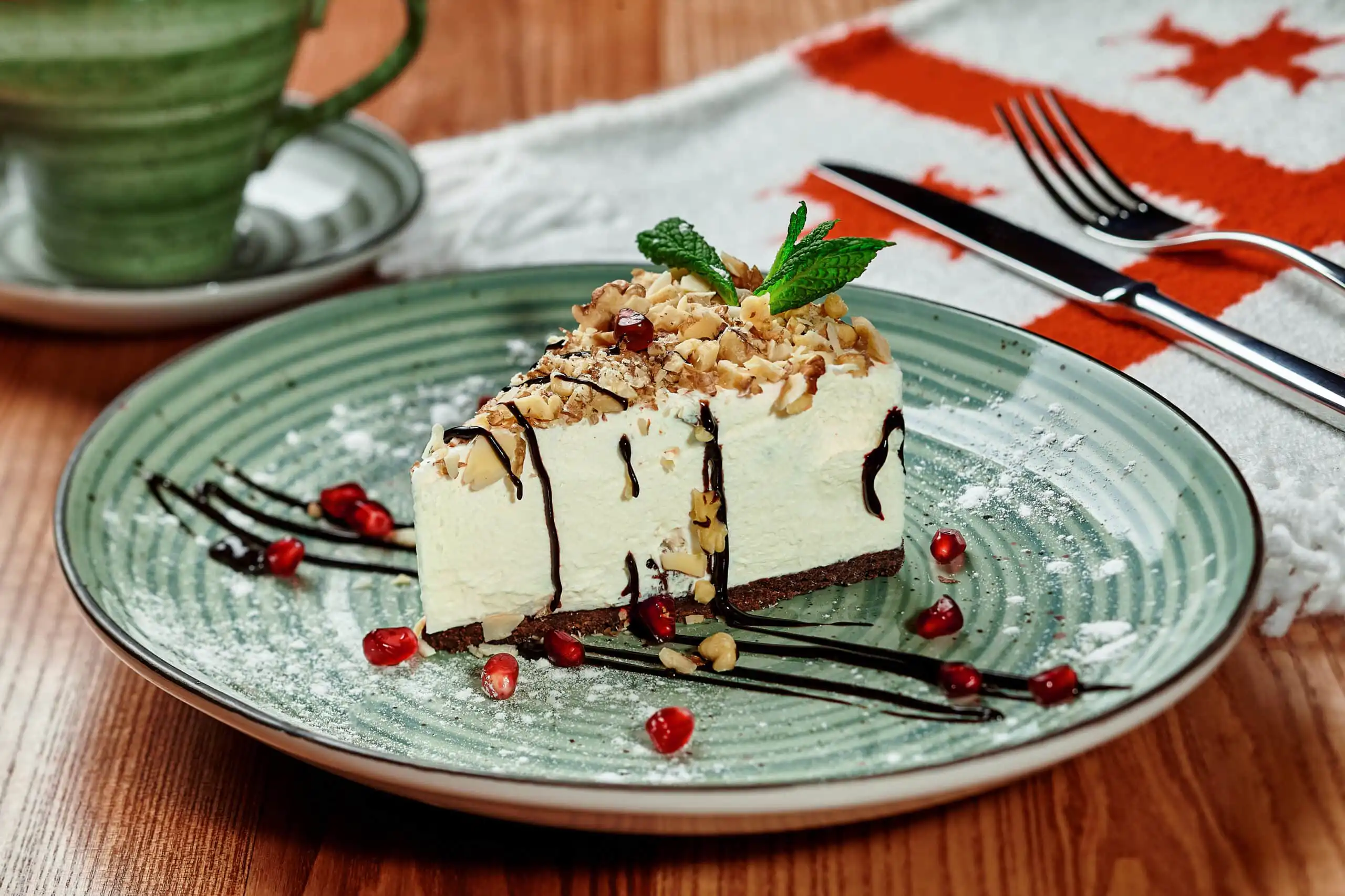 Slice of creamy Philadelphia cheesecake topped with fresh berries
