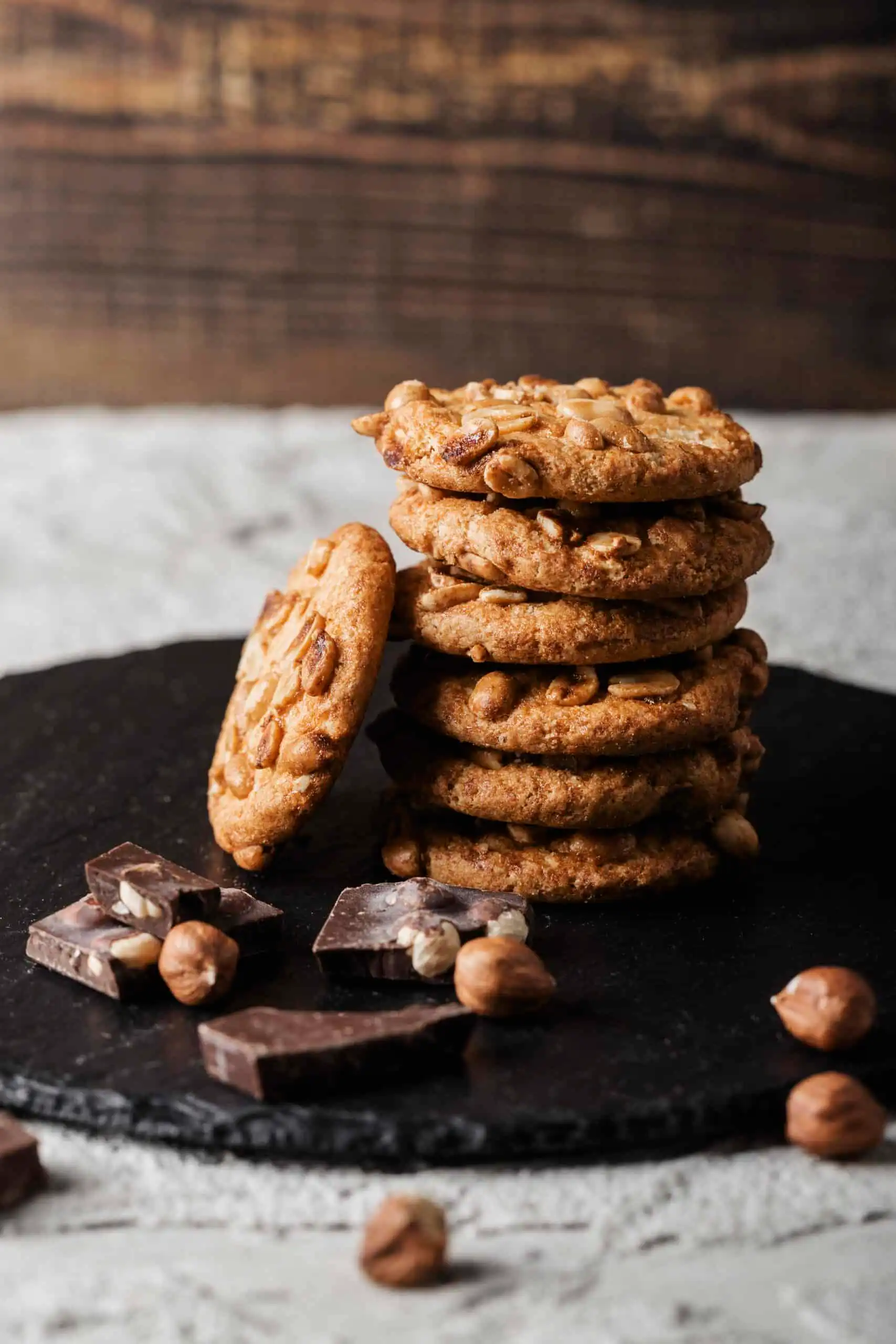 A plate of perfectly baked cookies with a golden-brown texture.